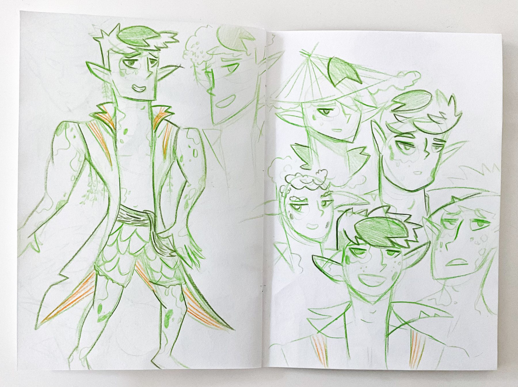 Green pencil sketches refining Koi's outfit